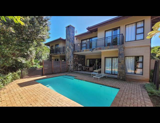 4 BEDROOM TOWNHOUSE TO LET IN ZIMBALI ESTATE